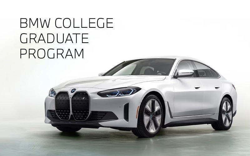 White BMW i4 parked. BMW College Graduate Program. | BMW Fresno in Fresno CA